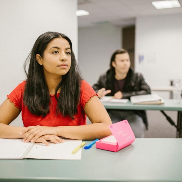 Woman Studying Inside the Classroom